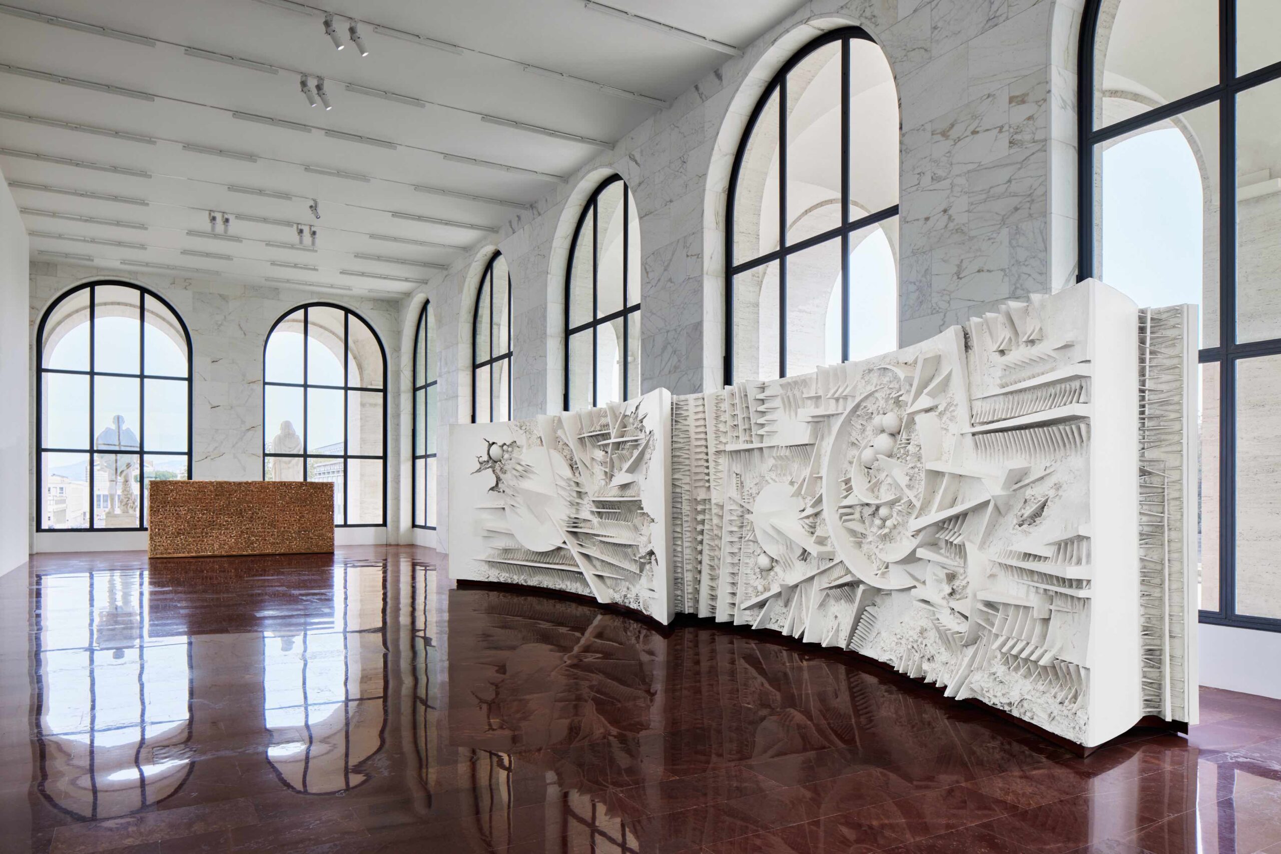 Fendi Collaborates with Italian Sculptor Arnaldo Pomodoro for an